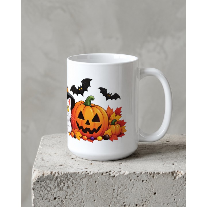 Kubek z dyniami i słodyczami na Halloween